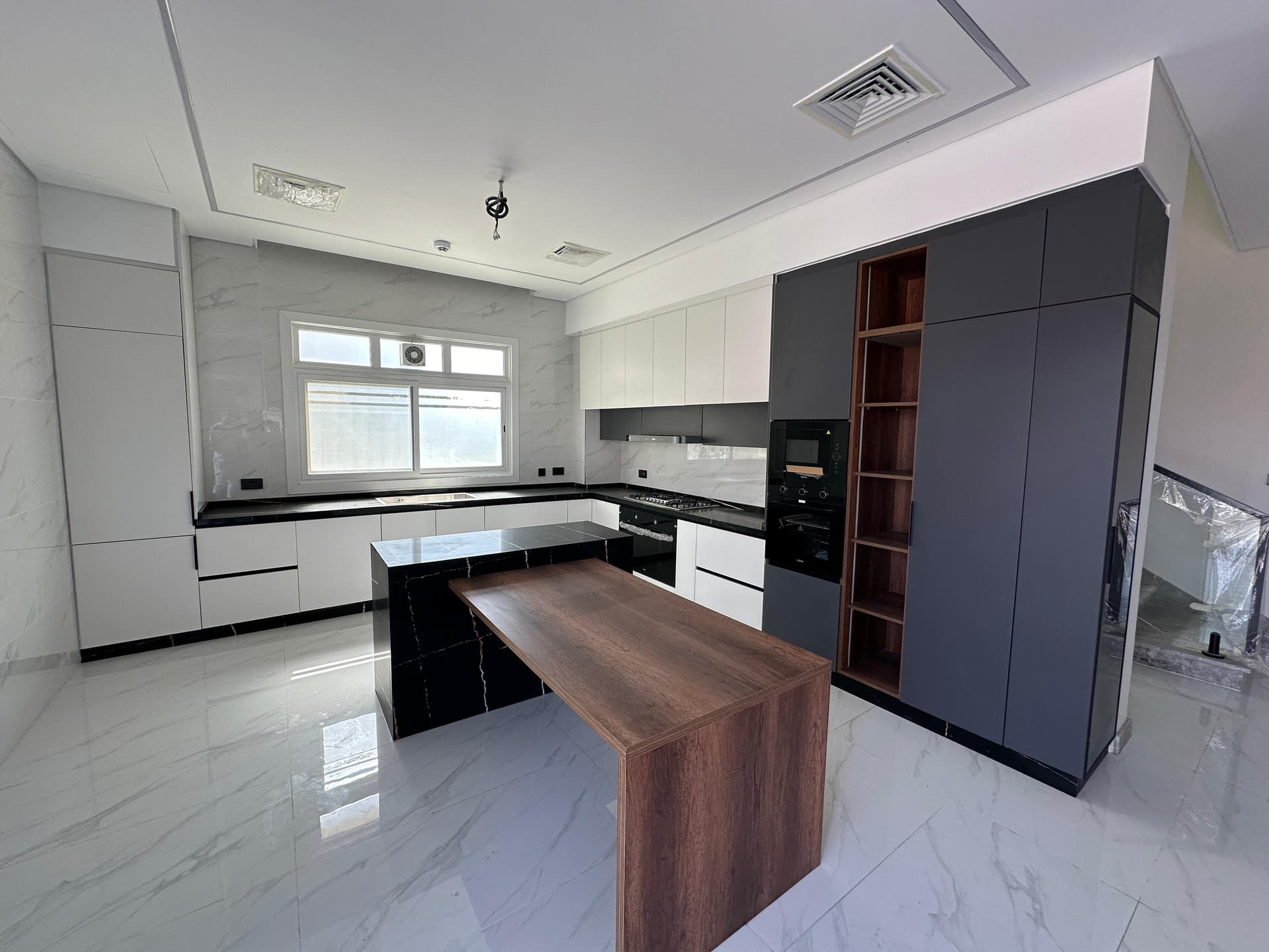 Classic ivory kitchen with brass hardware